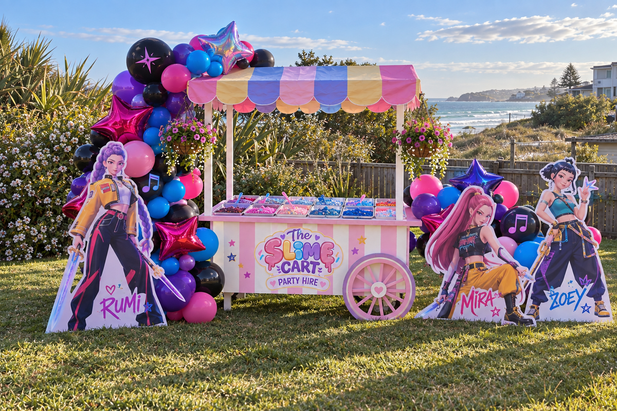 K-pop Demon Hunters themed Slime Cart in a coastal backyard with balloon garlands